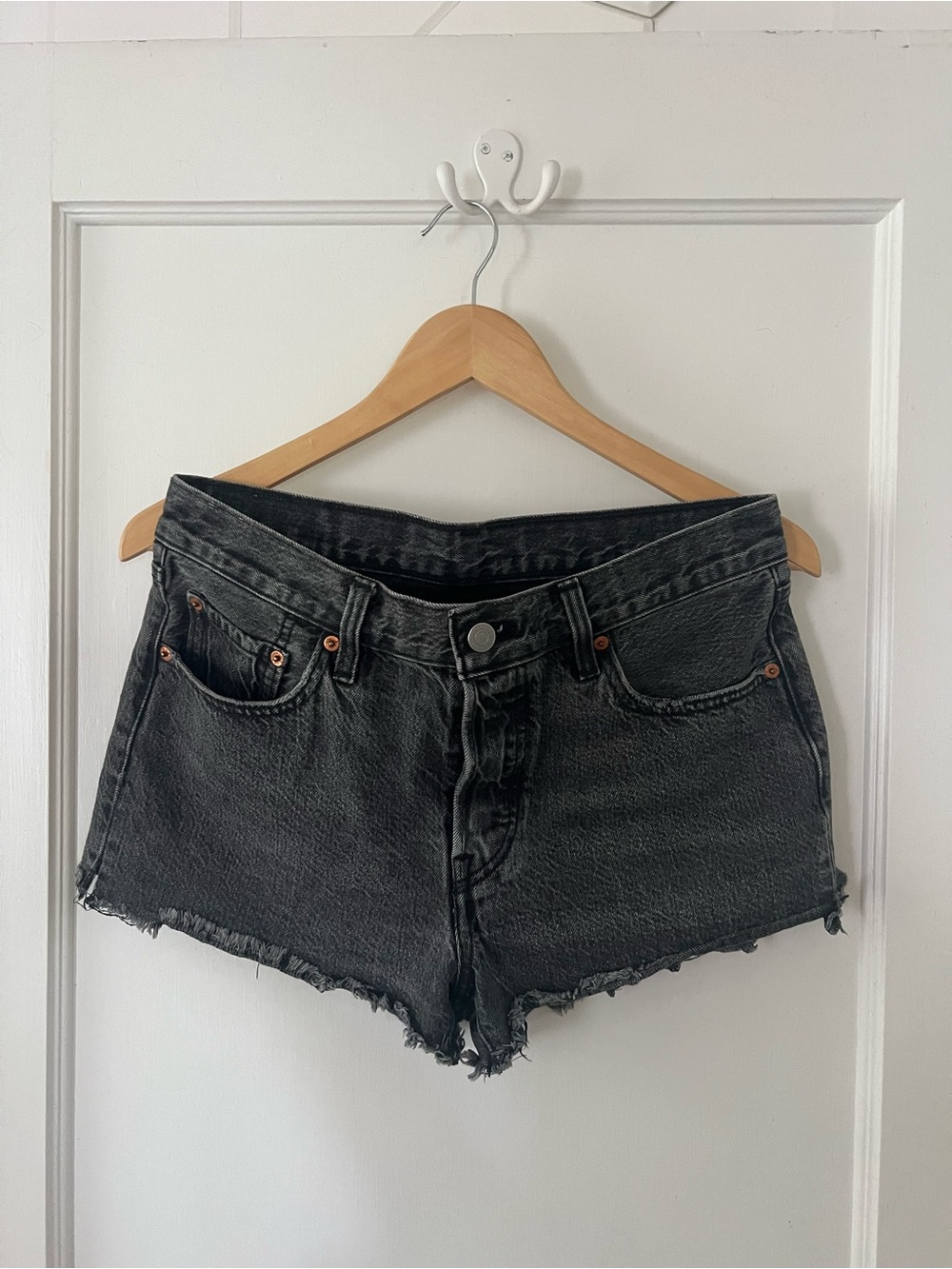Levi's Washed Black Frayed Denim Cutoff Shorts